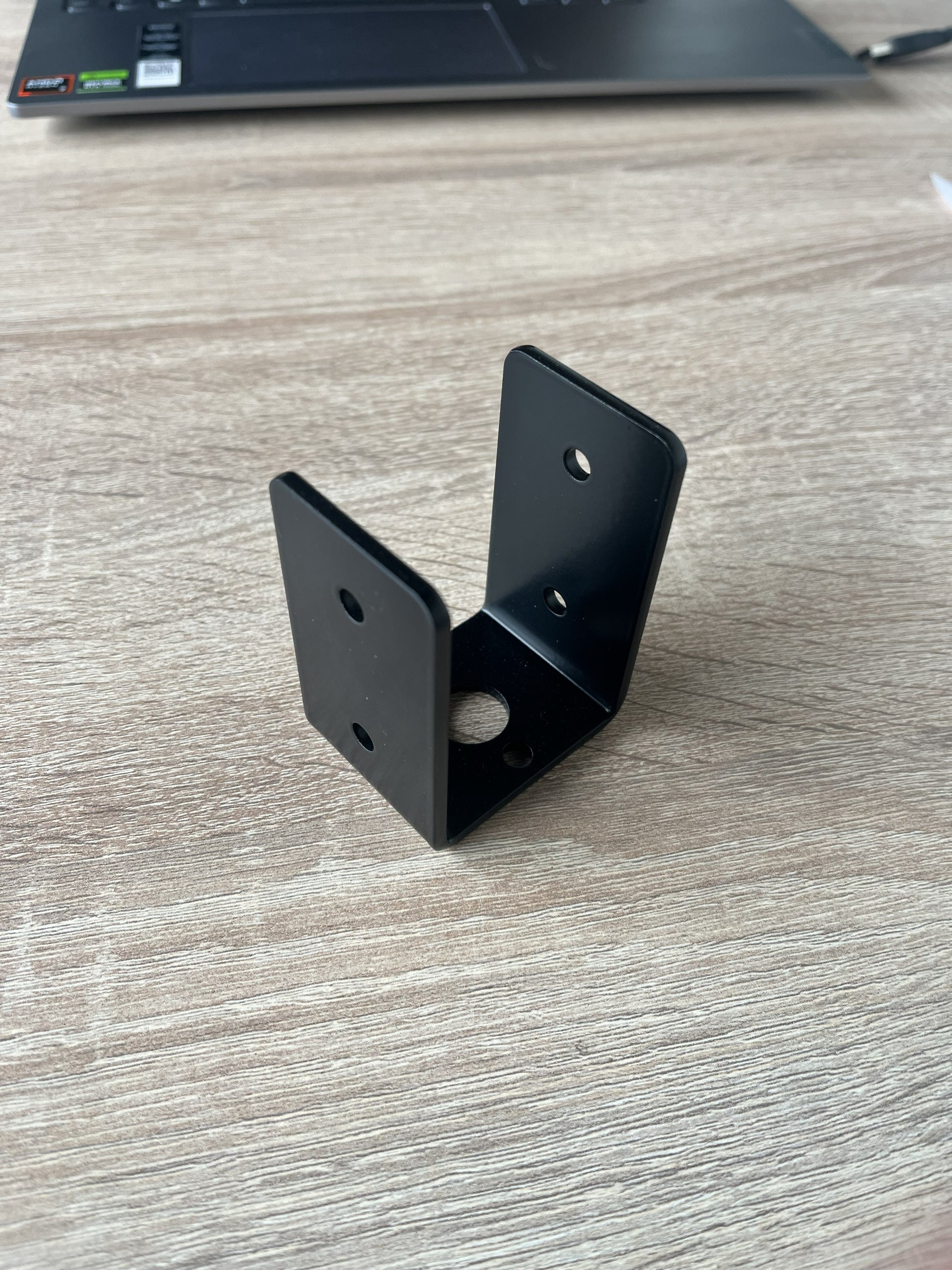 Support bracket for 45mm lumber by Terases, designed for beam in place installation, shown mounted in the image.